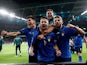 Italy celebrate beating Spain on penalties at Euro 2020 on July 6, 2021