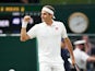 Roger Federer celebrates at Wimbledon on July 5, 2021