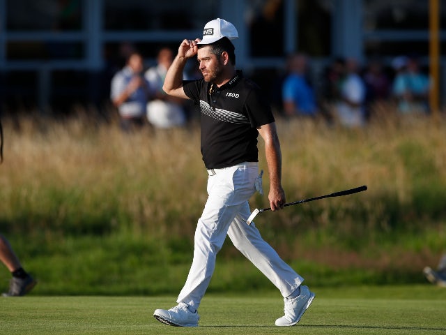 Louis Oosthuizen sets new Open record to claim halfway lead