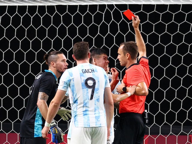 Francisco Ortega of Argentina is shown a red card by referee Leodan Gonzalez on July 22, 2021