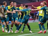 Marco Tilio of Australia celebrates scoring their second goal with teammates on July 22, 2021