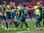 Marco Tilio of Australia celebrates scoring their second goal with teammates on July 22, 2021
