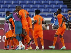 Franck Kessie of Ivory Coast celebrates scoring their second goal with teammates on July 22, 2021