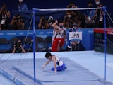 Kohei Uchimura pictured after falling during his high bar routine at the Tokyo Olympics on July 24, 2021