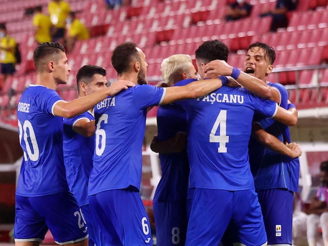 Romania players celebrate their first goal on July 22, 2021