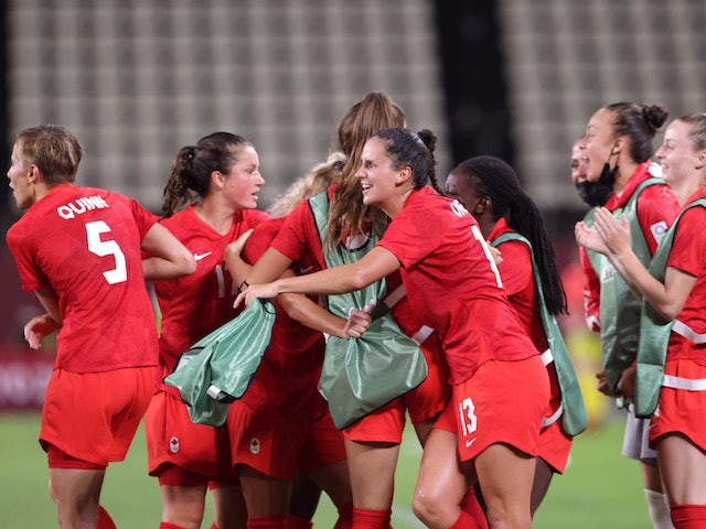 Adriana Leon of Canada celebrates after scoring their first goal with teammates on July 27, 2021