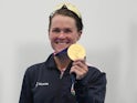 Flora Duffy celebrates triathlon gold at the Tokyo 2020 Olympics on July 27, 2021