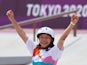 Momiji Nishiya celebrates winning skateboarding gold at the Tokyo Olympics on July 26, 2021