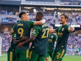 Portland Timbers forward Felipe Mora (9) celebrates his goal with forward Dairon Asprilla (27) against the Minnesota United in the first half at Allianz Field on July 24, 2021