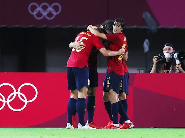 Rafa Mir of Spain celebrates scoring their fourth goal with teammates on July 31, 2021