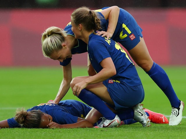 Madelen Janogy of Sweden celebrates scoring their second goal with teammates on July 27, 2021