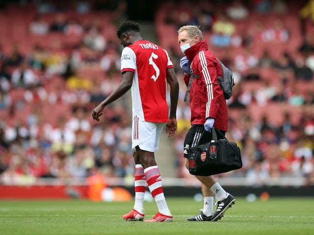 Arsenal's Thomas Partey receives medical attention on August 1, 2021