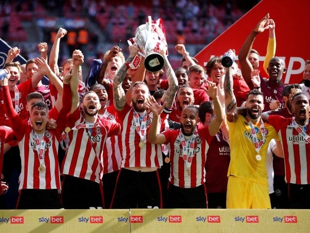 Brentford's Pontus Jansson lifts the trophy after winning Championship Play-Off Final pictured on May 29, 2021