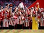 Brentford's Pontus Jansson lifts the trophy after winning Championship Play-Off Final pictured on May 29, 2021