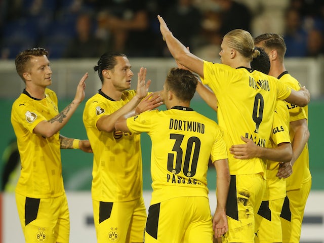 Borussia Dortmund's Erling Haaland celebrates scoring their third goal with teammates on August 7, 2021