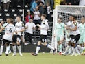 Derby County's Curtis Davies celebrates scoring their first goal with teammates on August 7, 2021