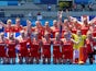 Players of Great Britain's women's team pose for a group photo after winning their match for bronze in hockey at the Tokyo Olympics