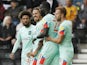 Huddersfield Town's Mouhamadou-Naby Sarr celebrates scoring their first goal with teammates on August 7, 2021