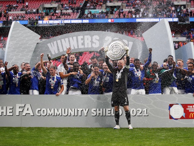 Leicester City's Kasper Schmeichel and teammates celebrate with the trophy after winning the FA Community Shield on August 7, 2021