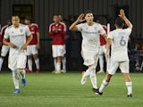 Real Salt Lake midfielder Damir Kreilach (8) celebrates with midfielder Pablo Ruiz (6) after scoring a goal against the Portland Timbers during the second half at Providence Park pictured on August 7, 2021