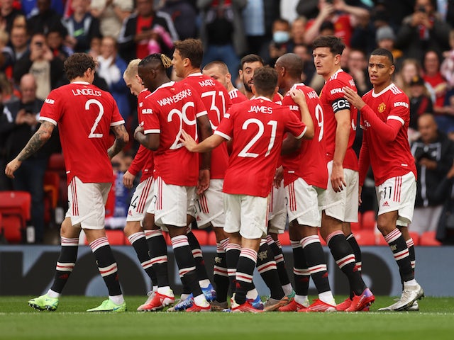 Manchester United players celebrate Harry Maguire's goal against Everton in a pre-season clash on August 7, 2021