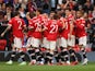 Manchester United players celebrate Harry Maguire's goal against Everton in a pre-season clash on August 7, 2021