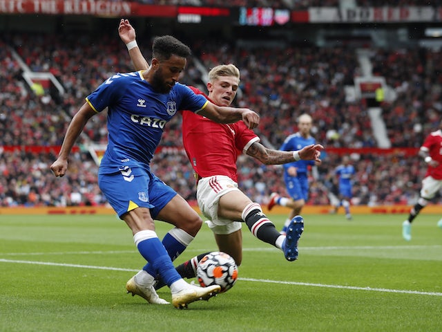 Everton's Andros Townsend in action with Manchester United's Brandon Williams on August 7, 2021