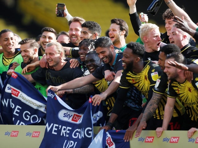 Watford players celebrate promotion to the Premier League pictured on April 24, 2021