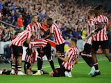 Sergi Canos celebrates scoring for Brentford against Arsenal in the Premier League on August 13, 2021