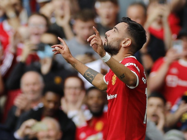 Manchester United's Bruno Fernandes celebrates scoring against Leeds United in the Premier League on 14 August 2021