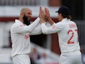 England's Moeen Ali celebrates the wicket of India's Mohammed Shami on August 13, 2021