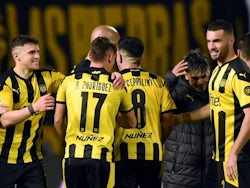 Penarol players celebrate after the match against Nacional on July 22, 2021
