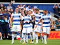 Queens Park Rangers' Moses Odubajo celebrates with teammates pictured on July 24, 2021