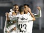 Santos' Lucas Braga celebrates with teammates after an own goal scored by Libertad and Santos' second on August 13, 2021