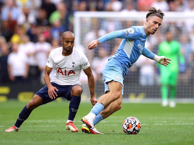 Manchester City's Jack Grealish in action with Tottenham Hotspur's Lucas Moura in the Premier League on August 15, 2021