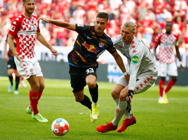 RB Leipzig's Andre Silva in action with Mainz 05's Robin Zentner on August 15, 2021