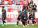 RB Leipzig's Brian Brobbey and teammates look dejected after the match against Mainz 05 on August 15, 2021
