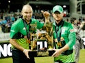 Southern Brave's Alex Davies and Jake Lintott celebrate with the trophy after winning The Hundred Final on August 21, 2021