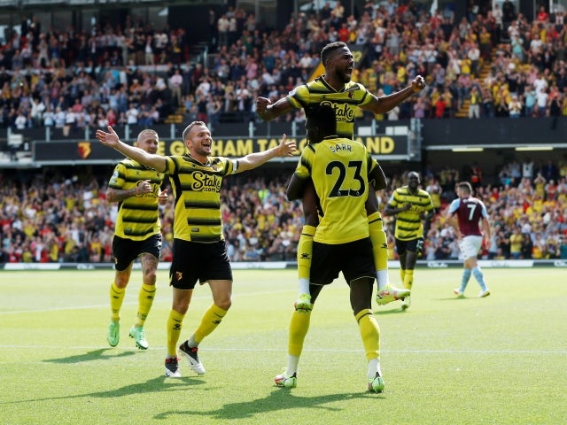 Watford's Emmanuel Dennis celebrates scoring on his debut against Aston Villa on August 14, 2021