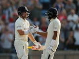 England's Rory Burns celebrates his half century with Haseeb Hameed on August 25, 2021