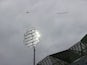 A plane flies overhead with a banner reading 'Sack the ECB and save test cricket on August 27, 2021