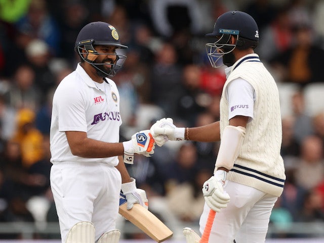 Defiant India dig deep to put the brakes on England victory bid