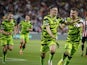 Forest Green Rovers' Jack Aitchison celebrates scoring their first goal with teammates on August 24, 2021