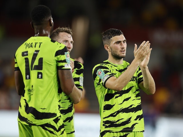 Forest Green Rovers' Jordan Moore-Taylor acknowledges the fans after the match on August 24, 2021