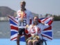 Gold medalists Lauren Rowles and Laurence Whiteley of Britain hold a national flag as they pose with their medals in 2016