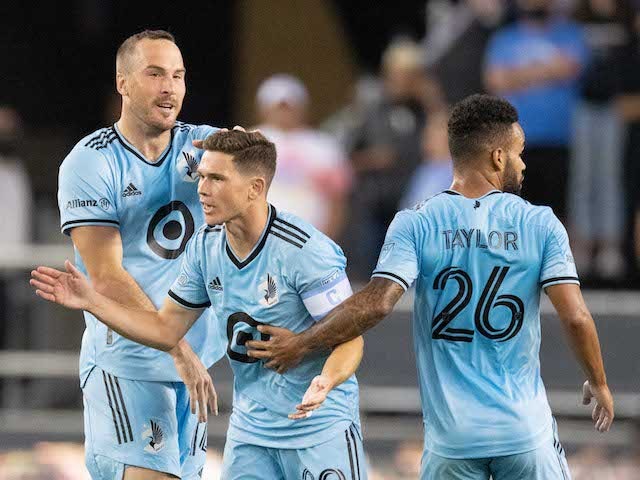 Minnesota United midfielder Will Trapp (20) is congratulated by defender Brent Kallman (14) and defender D.J. Taylor (26) for scoring a goal against the San Jose Earthquakes during the first half at PayPal Park on August 17, 2021
