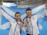 Neil Fachie and pilot Matt Rotherham of Scotland pose with medals in 2018