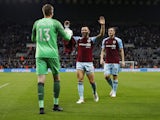 Burnley's Wayne Hennessey, Phil Bardsley and Chris Wood celebrate on August 25, 2021