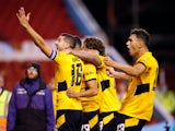 Wolverhampton Wanderers' Romain Saiss celebrates scoring their first goal against Nottingham Forest in the EFL Cup on August 24, 2021