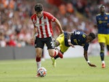 Southampton's Tino Livramento in action with Manchester United's Fred on August 22, 2021